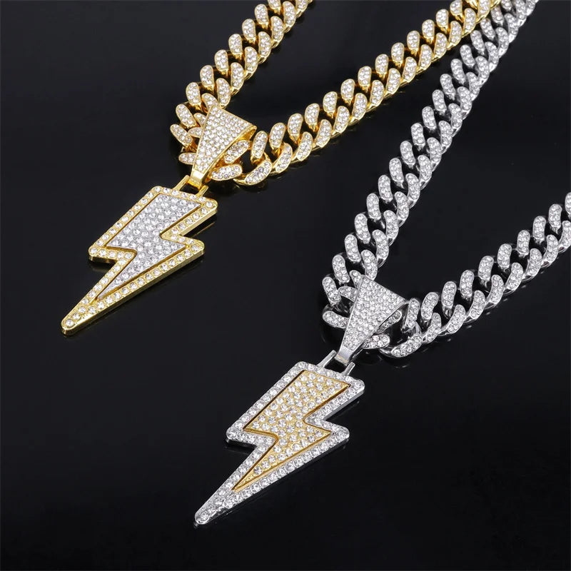 Gold and silver zircon lightning pendants with purple cz zircon pave set on a 20 inch iced out Miami Cuban chain
