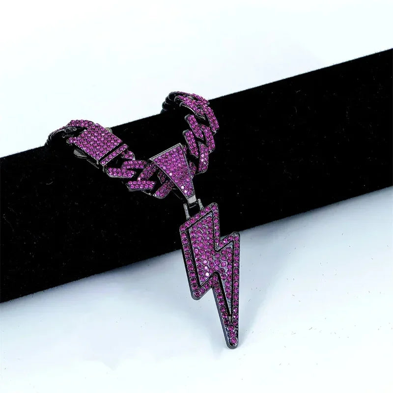 A vibrant purple cz zircon lightning pendant with sparkling rhinestones on a 20inch iced out miami cuban chain