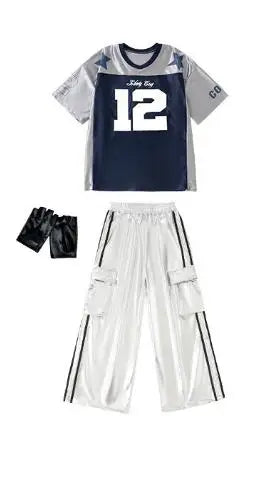 Navy blue and gray hip hop girls t-shirt with white number 12 paired with shiny silver cargo pants featuring black stripes