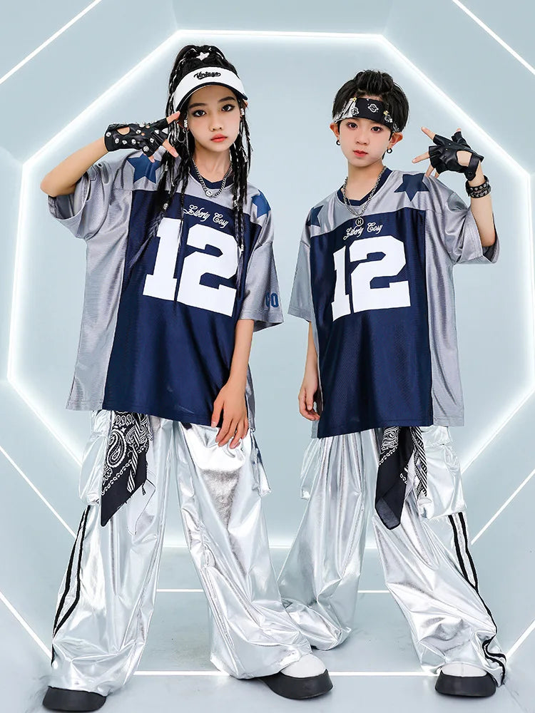 Silver and navy blue salty boy number 12 jersey with star accents paired with shiny cargo pants for cool street dance girls