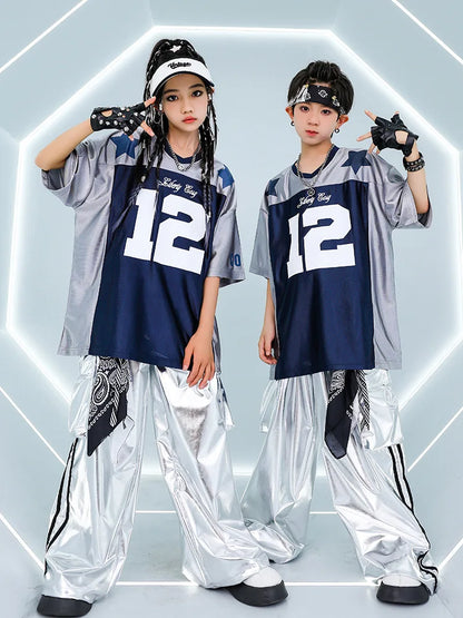 Silver and navy blue salty boy number 12 jersey with star accents paired with shiny cargo pants for cool street dance girls