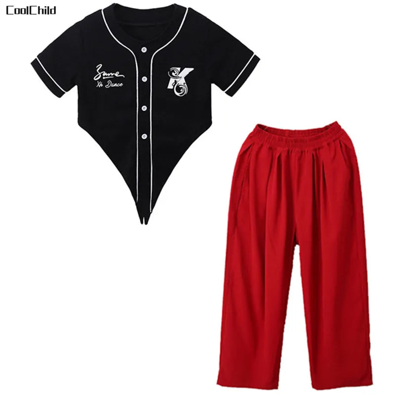 Black short-sleeved baseball-style crop t-shirt with white piping and stylized x logo for kids street dancewear