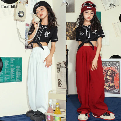 Black cropped baseball style top with white piping front buttons and tie front design for hip hop street dance wear