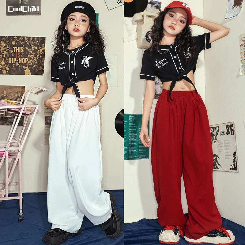 Black cropped baseball-style top with white piping and tie-front button details for hip hop girls street dance wear