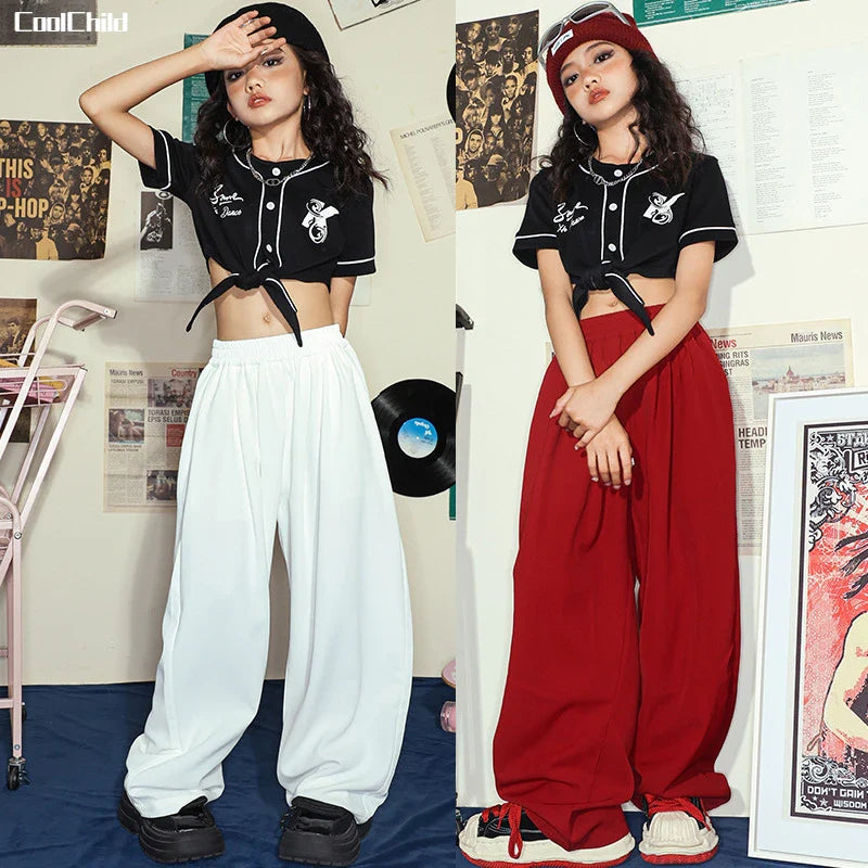 Black cropped baseball-style top with white piping and front tie detail for hip hop girls street dance wear