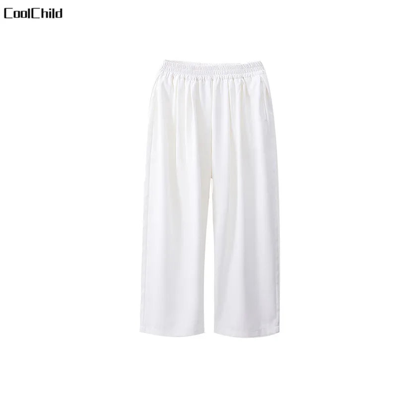 White coolchild cropped pants with elastic waistband and smooth flowing fabric for kids hip hop street dance wear