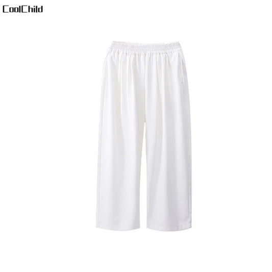 White coolchild cropped pants with elastic waistband and smooth flowing fabric for kids hip hop street dance wear