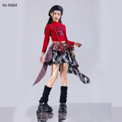 Red long-sleeved crop top with black and white plaid overlay and red straps for hip hop girls street dance cargo style