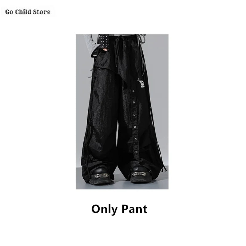 Black wide-leg cargo pants kids with drawstring waist and button detailing for girl group streetwear and street dance clothes