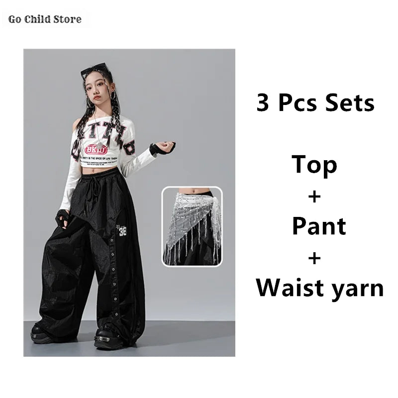 Black wide-leg cargo pants kids with drawstring waist and button details for street dance clothes and girl group streetwear