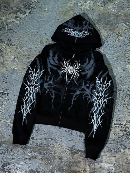 Black zip-up hoodie with bold white spider graphic and tribal sleeve designs featuring worldwide print for y2k retro streetwear