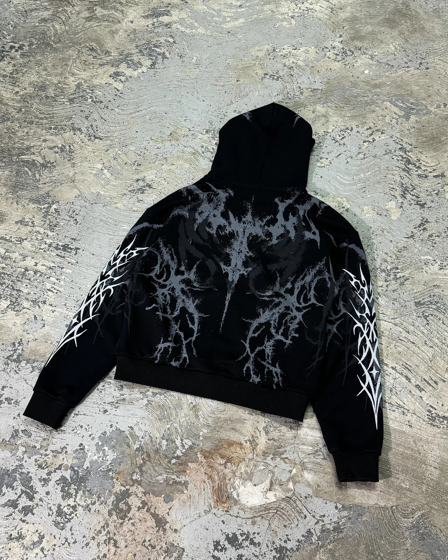 Black hoodie with intricate white and gray tribal embroidery on back and sleeves for women y2k retro streetwear