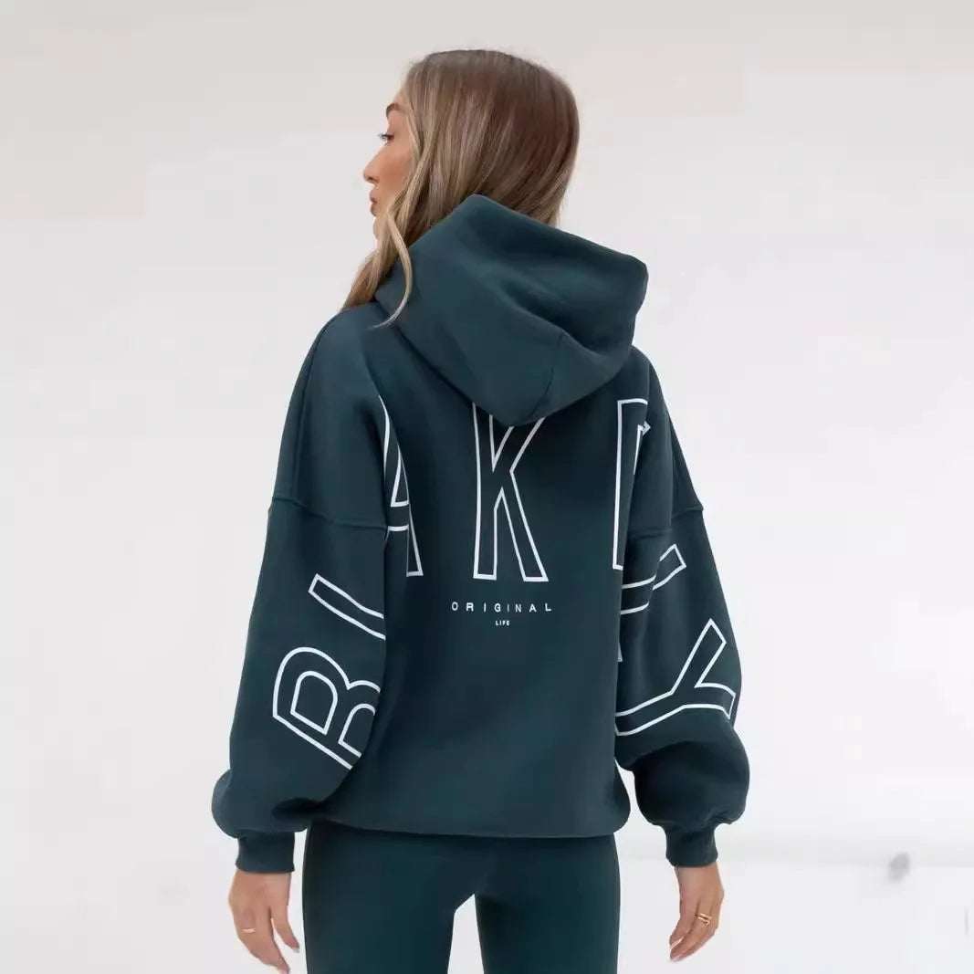 Dark green oversized hoodie men y2k with bold white outlined lettering on back and sleeves harajuku high street style