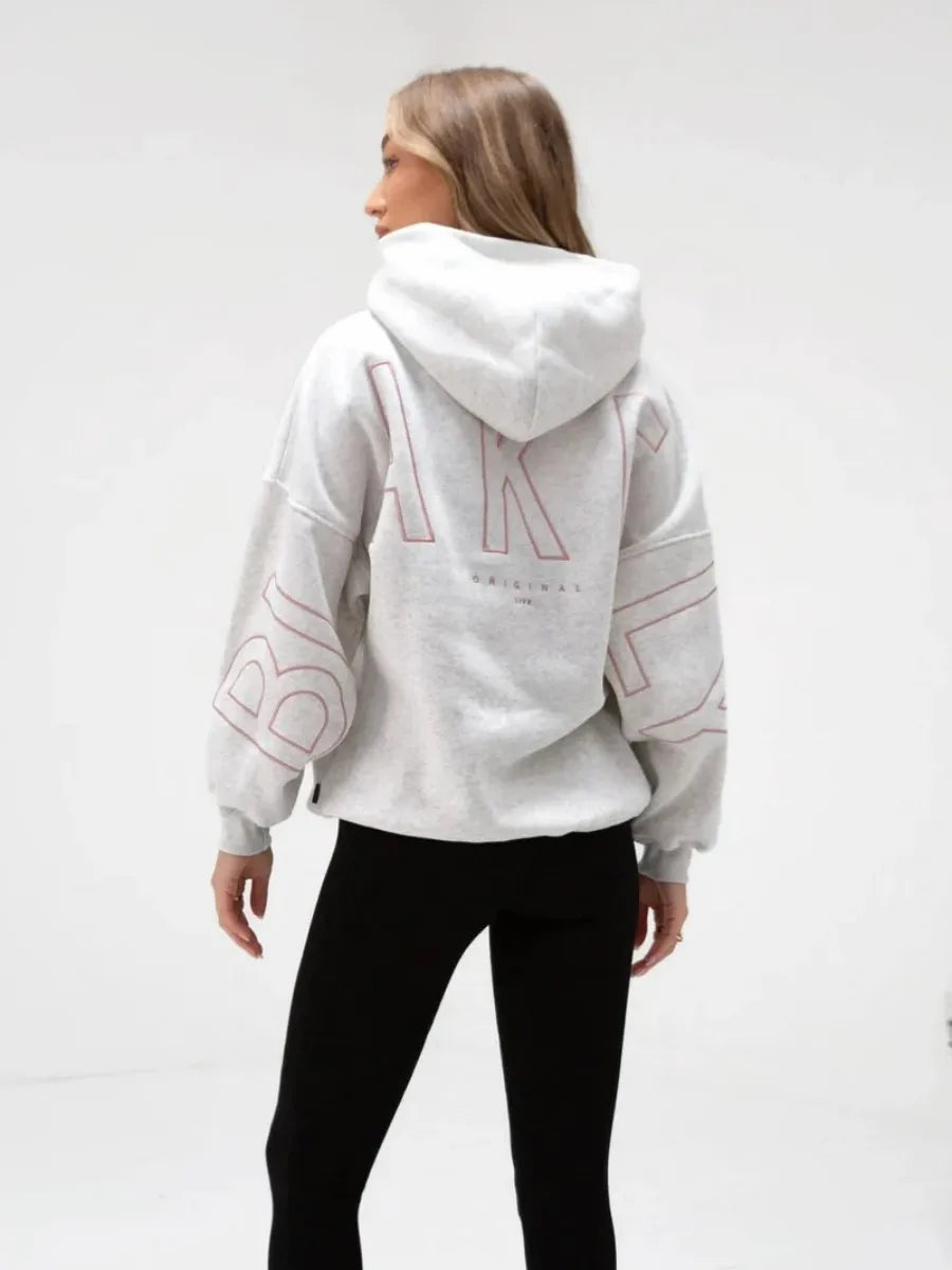 White oversized hoodie men y2k with bold muted pink outlined lettering on back and sleeves harajuku high street retro gothic punk