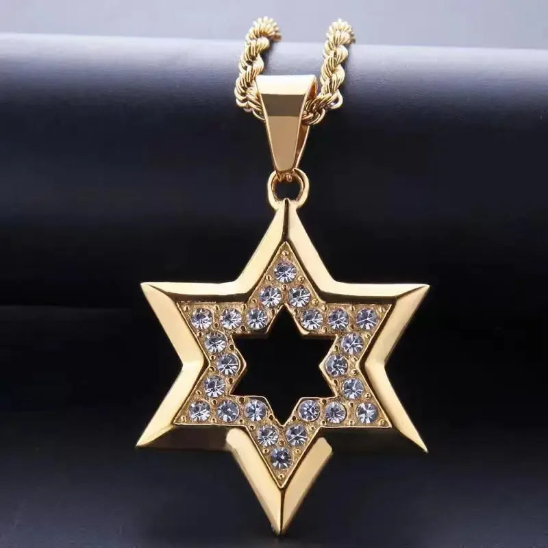 Gold-colored star of david pendant with clear rhinestones on edges hanging from a gold rope chain for hip hop jewelry