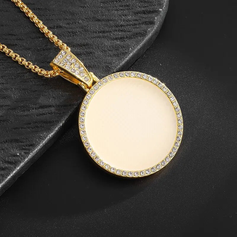Gold-colored dollar money bag necklace with shiny cubic zirconia bezel set and empty cream center for personalization