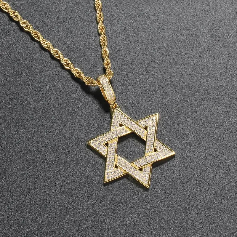 Gold-colored star of david pendant with shiny cubic zirconia pave setting on a gold rope chain money bag necklace