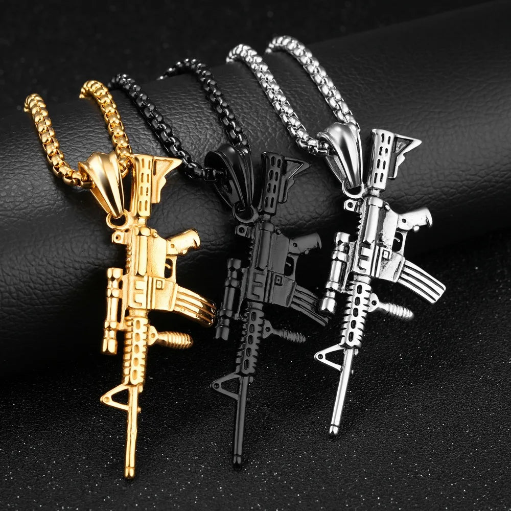 Three metallic rifle-shaped gun necklaces in gold, black, and silver with silver alloy pendant for rapper men streetwear