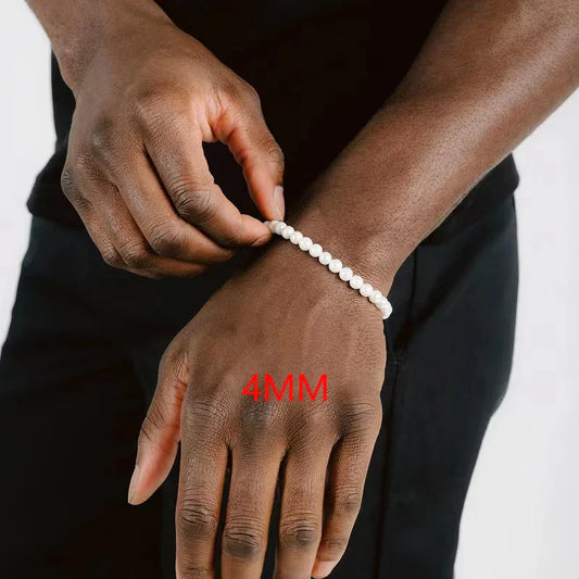 White 4mm round bead bracelet made of vintage white abs acrylic worn on wrist hip hop imitation pearls style