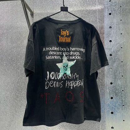 Black cotton t-shirt with hip hop letters, box graphics rhinestone, damaged hole paly design featuring teal skull and text