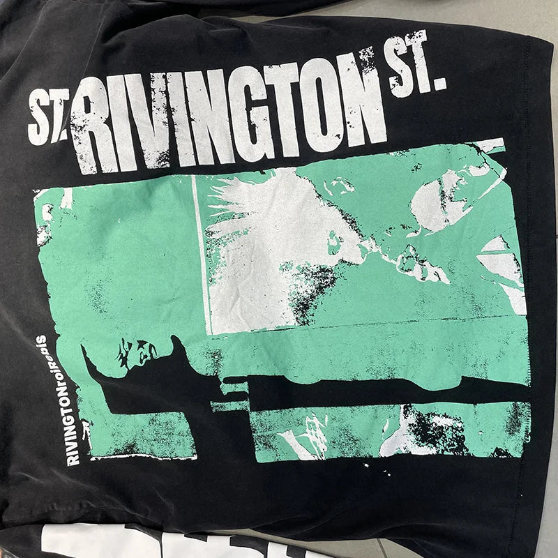 Black cotton oversized vintage t-shirt with distressed green and white hip hop letters logo graphic for men and women