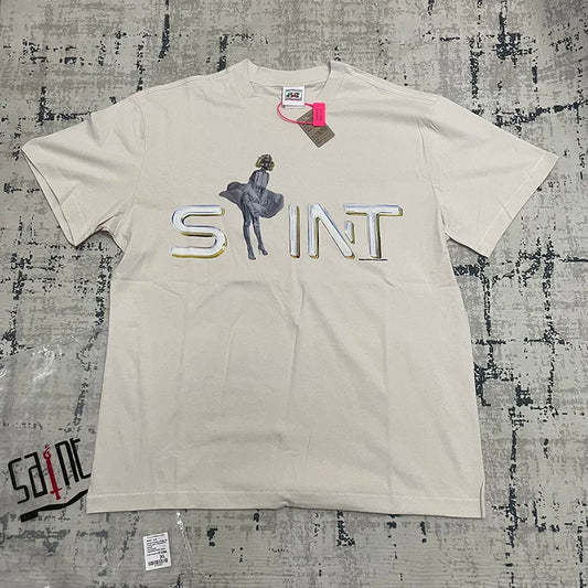 Cream-colored cotton short sleeve t-shirt with hip hop mechanical dancer print featuring marilyn monroe vintage cement white