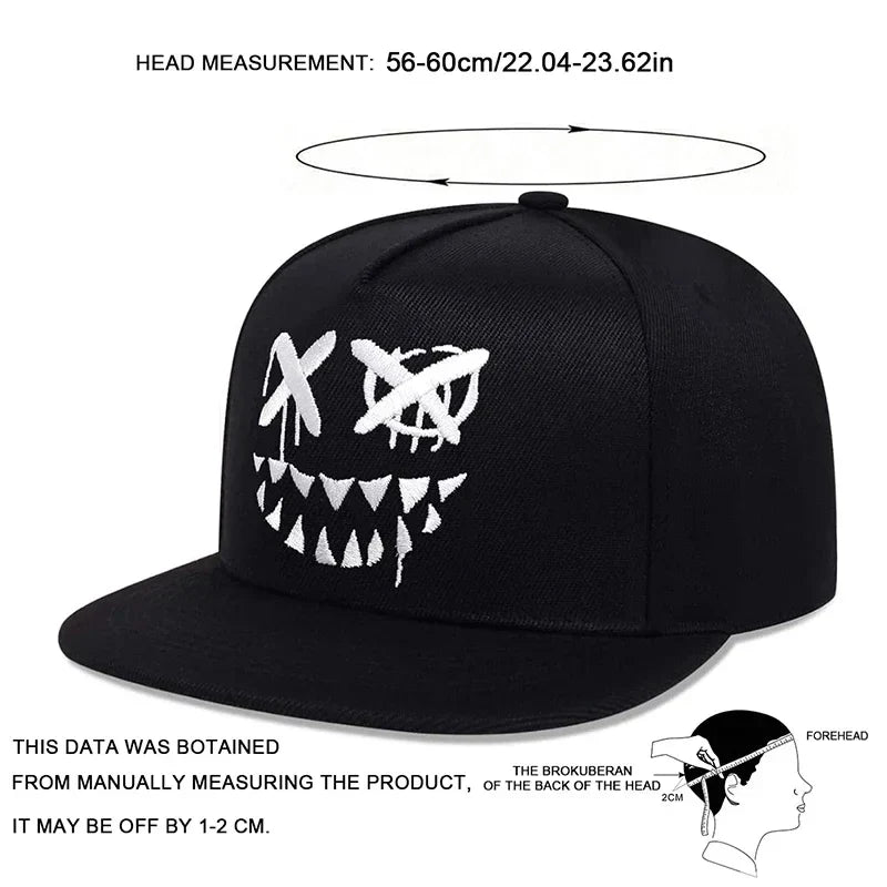 Black hip hop men cap with white personalized embroidered face featuring x-shaped eyes on adjustable cotton snapback