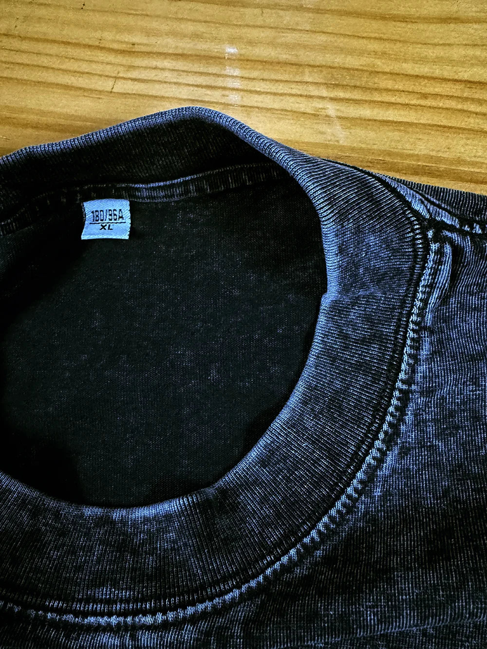 Dark blue slightly faded cotton t-shirt with ribbed crew neck and stitching for harajuku hip hop shirt streetwear graphic