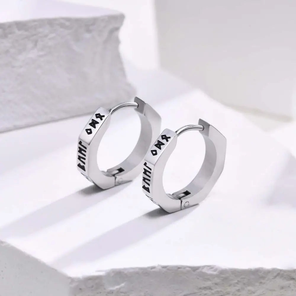 Silver-toned stainless steel hexagonal hoop earrings with black engraved runes for hip hop street wear