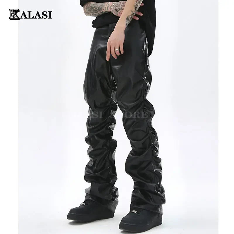 Black glossy faux leather hip hop pants with ruched detailing and pleats for casual streetwear use
