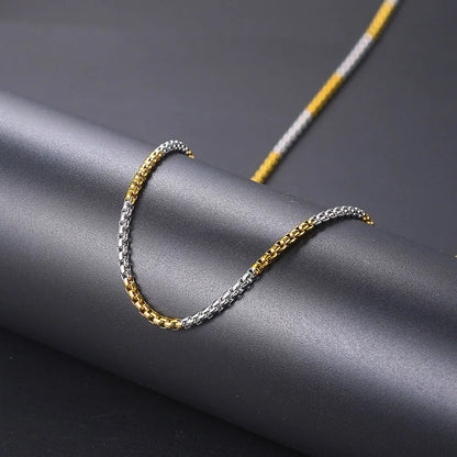 Two-tone gold and silver hip hop necklace featuring a steel necklace 3mm square pearl chain with interlocking design