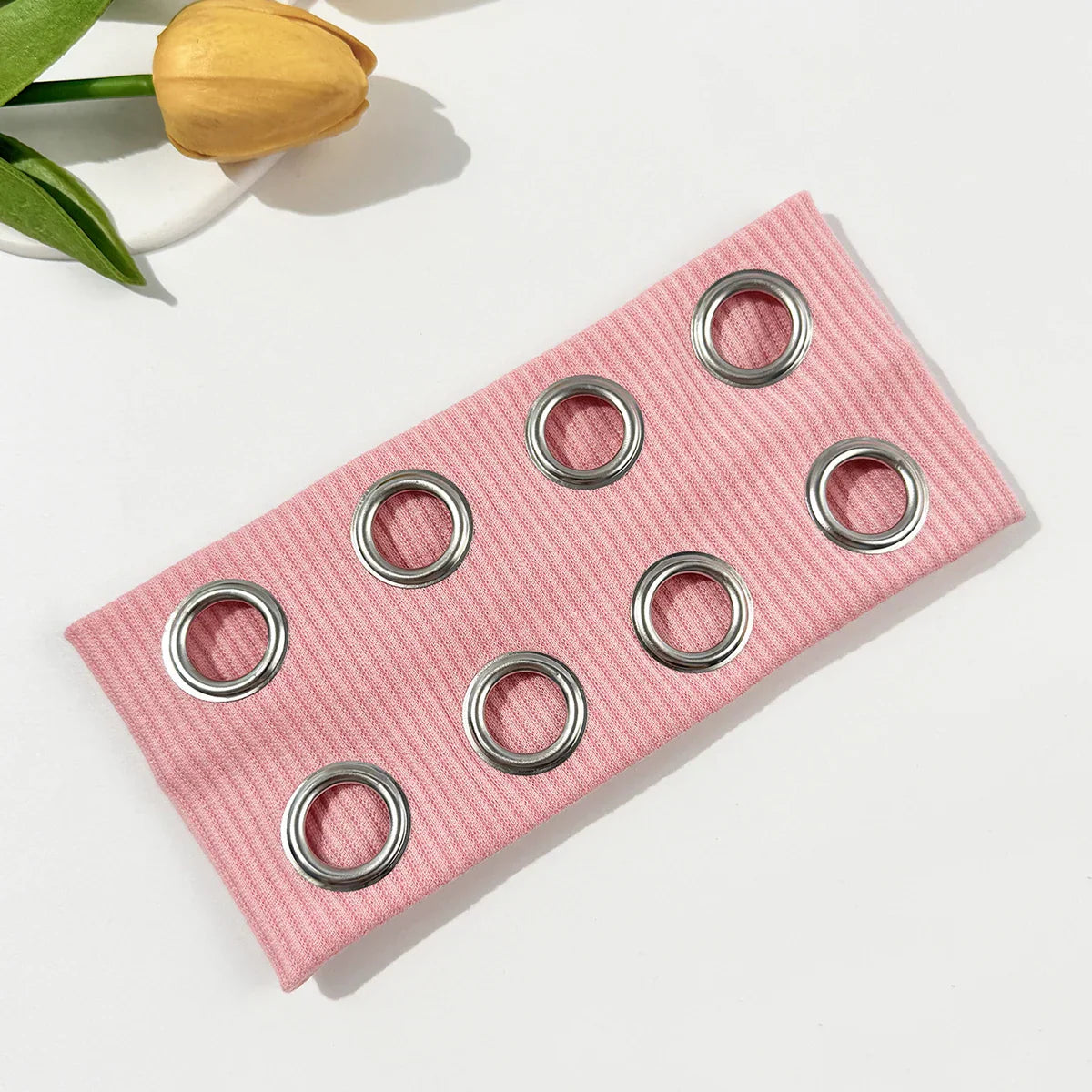 Pink ribbed fabric wide edge headband with seven silver-toned metal grommets retro elastic band for men and women