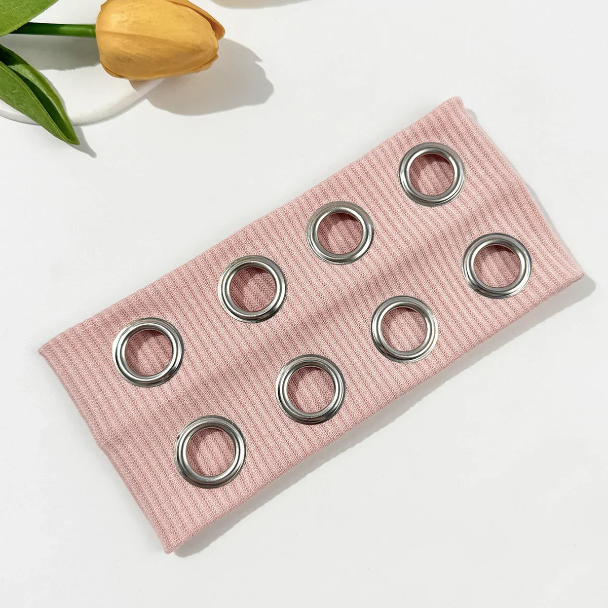 Pink ribbed fabric wide edge headband with seven silver metal grommets retro elastic band for unisex use