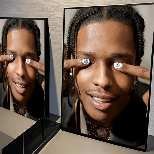 A framed hip hop rapper asap rocky art poster whitepaper print featuring braided hair and ornate necklace design