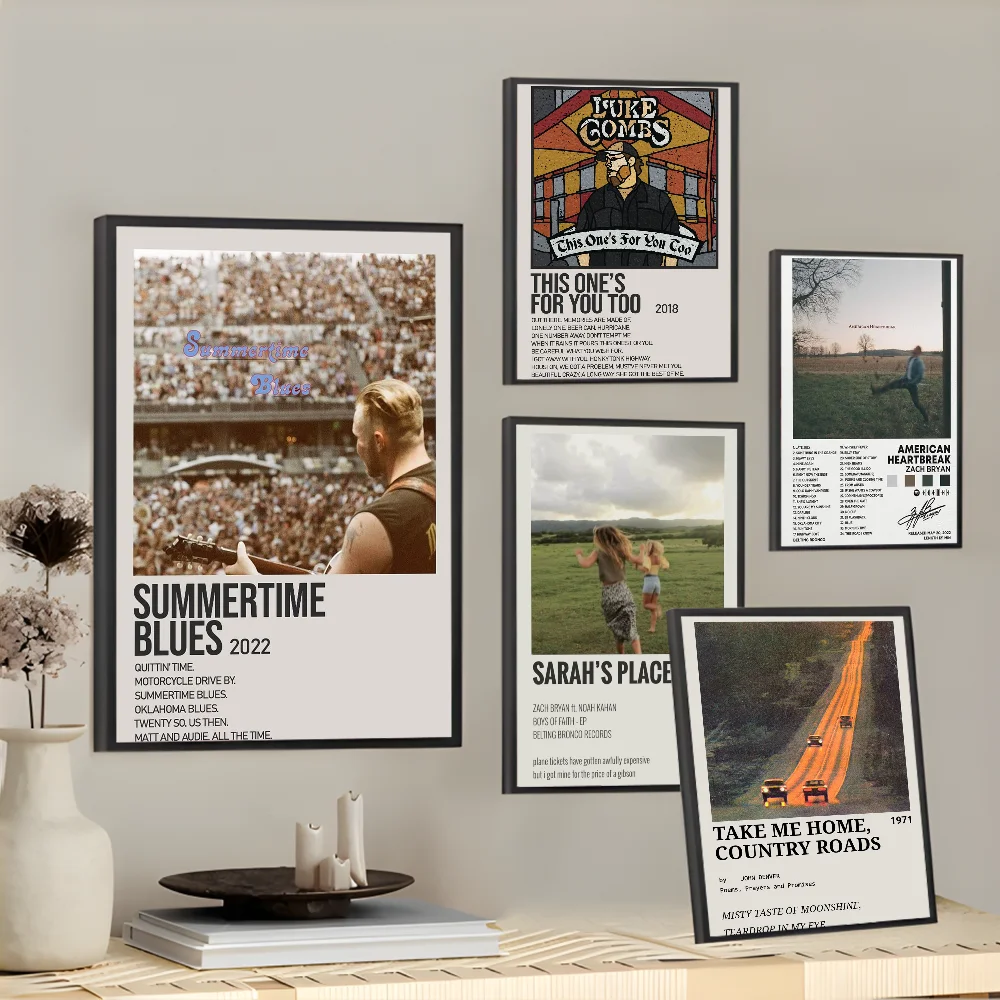 Black-framed zach bryan poster featuring man playing guitar at concert with summertime blues 2022 text for hip hop rapper music album decor