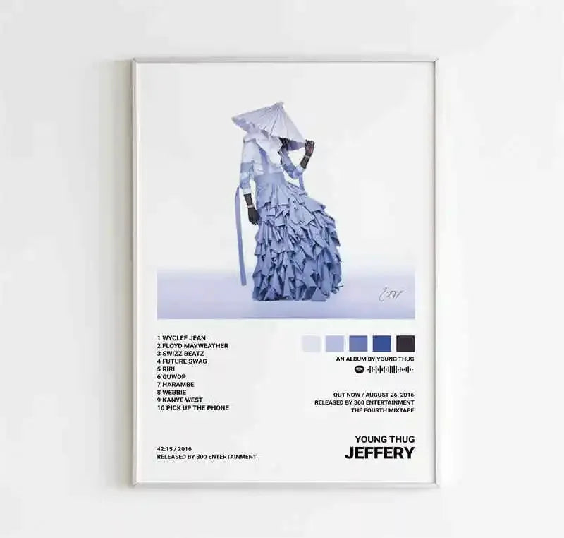 A framed room canvas painting of rapper young thug fun music album cover with layered blue dress and wide-brimmed hat