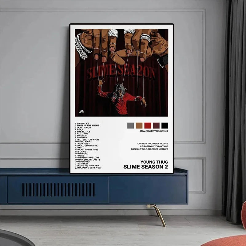 A framed room canvas painting of rapper young thug slime season 2 album cover with red figure and tracklist print