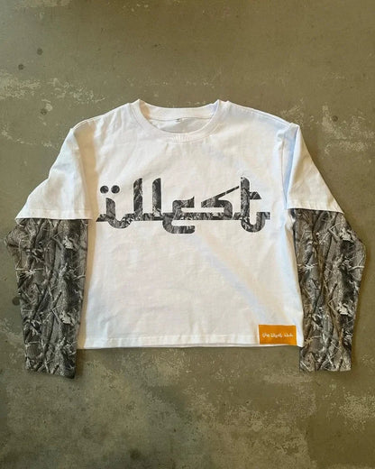White long-sleeved crop top with black arabic lettering and camouflage-patterned sleeves for men streetwear hoodie