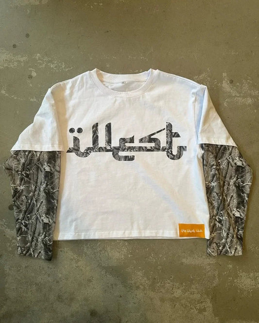 White long-sleeved crop top with black arabic lettering and camouflage-patterned sleeves for men streetwear hoodie