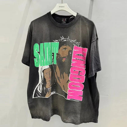 Black distressed high quality oversized hip hop retro t shirt with bold green and pink racing style graffiti saint kingdom design
