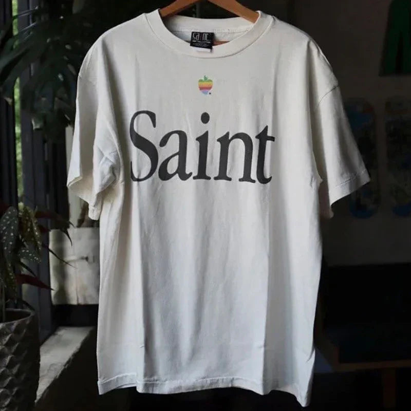 White cotton hip hop retro t-shirt with bold black saint print and small rainbow apple logo high quality oversized tee