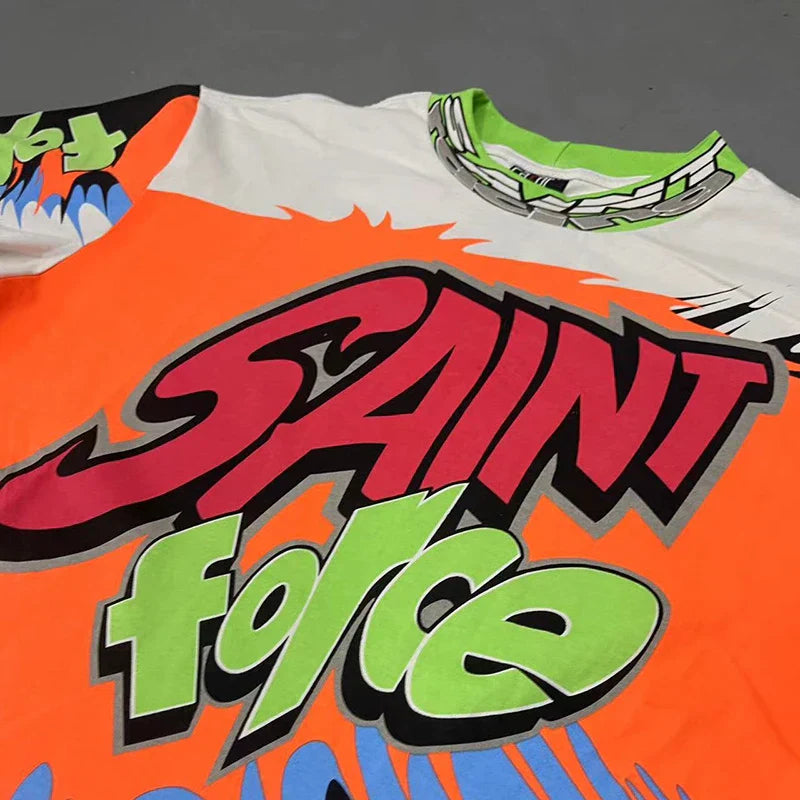 Vibrant orange high quality oversized hip hop retro t shirt with bold red and lime green racing style graffiti lettering