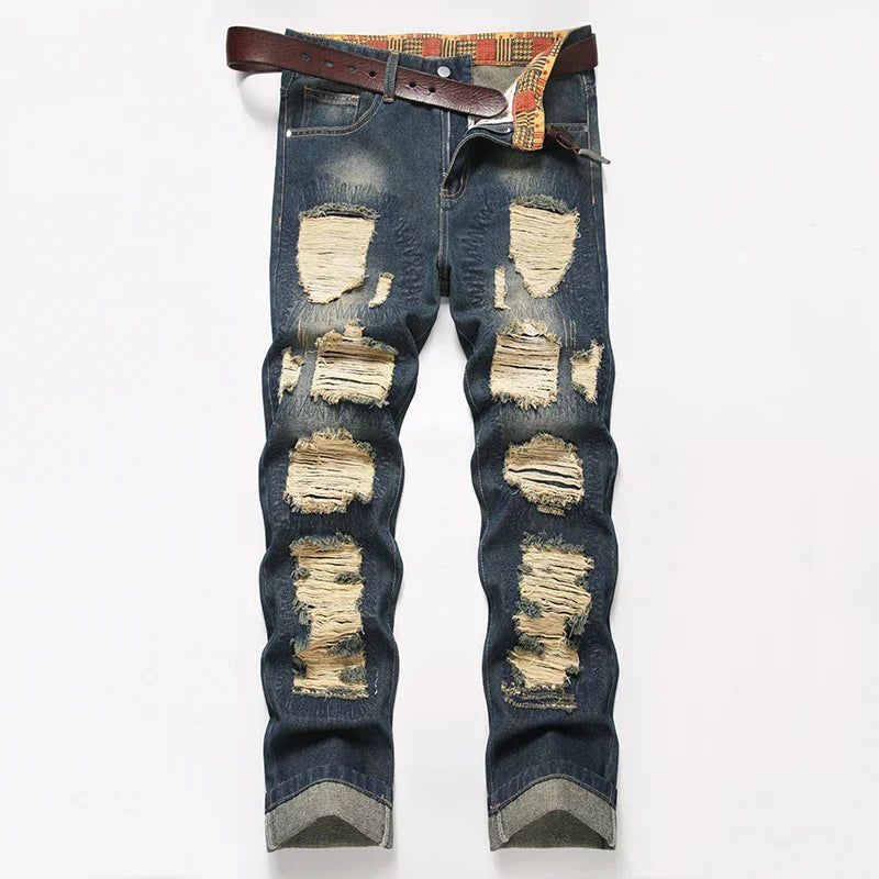 Dark blue distressed rock motorcycle denim jeans with frayed patches and a brown belt in retro american streetwear style