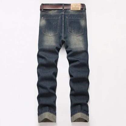 Dark-wash rock motorcycle denim loose straight trousers with faded distressed look and rolled cuffs for retro american streetwear