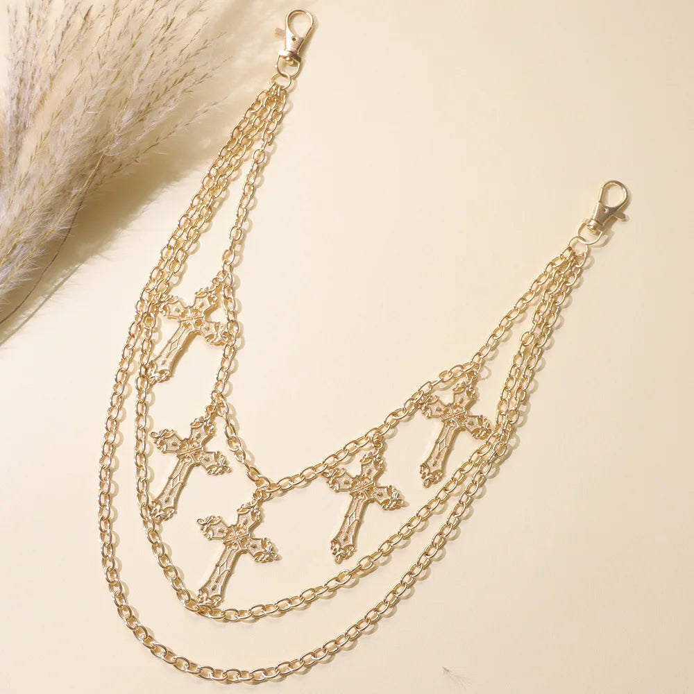Gold-toned metal body chain featuring layered hip hop rock cross waist chains with silver-tone clasps for punk style