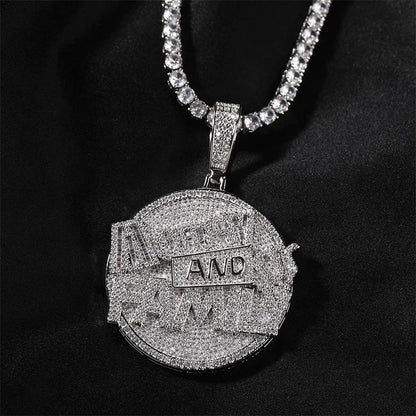 Silver ice cube pendant necklace with round coin pave crystal design and bold and text on iced out tennis chain necklace men rapper jewelry