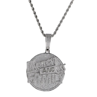 Silver ice pendant necklace with circular diamond-encrusted design and engraved details on men rapper jewelry tennis chain necklace