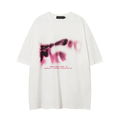White oversized cotton t-shirt with pink and black spray-painted graphic and text, hip-hop retro street style for women