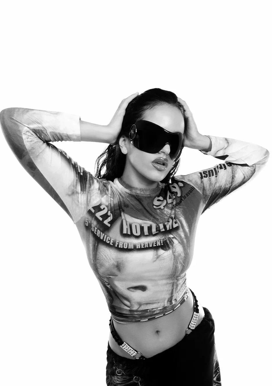 Black and white long sleeve crop top with bold text featuring hip hop singer Rosalia motomami music album design