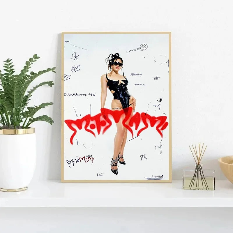 A framed canvas painting wall art of hop singer Rosalia in a black bodysuit with red graffiti from motomami album